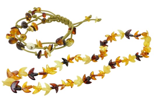 Necklace and Bracelet Made of Natural Amber on White Isolated