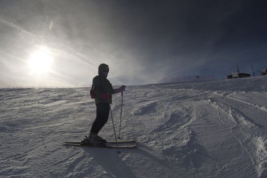 girl skiing on the slope - italian dolomites