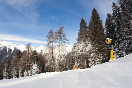 snow cannon in italian Dolomites