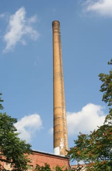 High smoke stack belonging to an old factory