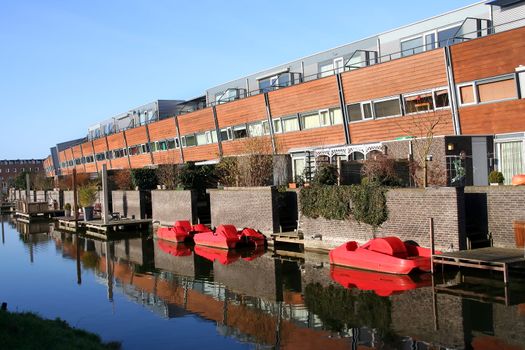 Water bikes and boats in a residential neighbourhood