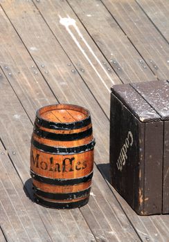 wood barrel standing standing on a wooden pier