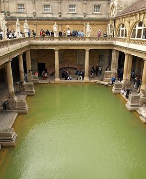 
CITY OF BATH, ENGLAND � JULY 6: Tourists inside the ancient Roman Bath Museum, West England, July 6, 2009. The Baths are a major tourist attraction and receive more than one million visitors a year.

