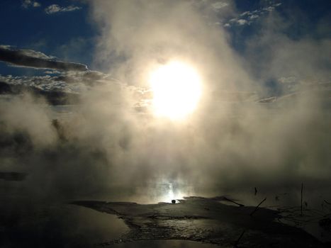 Setting Sun through Geothermal Mists. Kuirau Park, Rotorua, New Zealand
