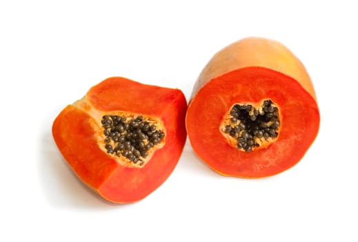 Slice of bright orange sweet mellow papaya isolated on white