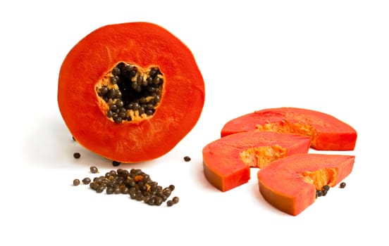 Slice of bright orange sweet mellow papaya isolated on white
