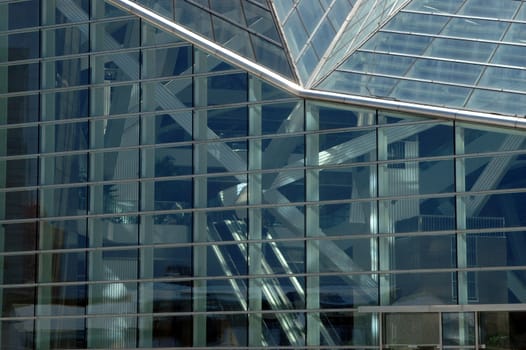 China, Guangdong province, Shenzhen city. Modern library with special design, fully covered with glass panels, inside steel irregular construction.