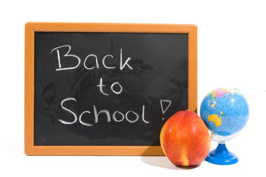chalkboard with text back to school and apple and globe