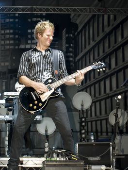 Duran Duran guitarist Dom Brown live on stage in Malta on 26th July 2008 during Red Carpet Massacre Tour