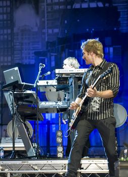 Duran Duran guitarist Dom Brown live on stage in Malta on 26th July 2008 during Red Carpet Massacre Tour