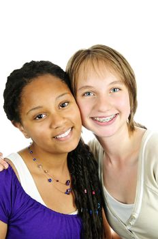 Isolated portrait of two diverse teenage girl friends
