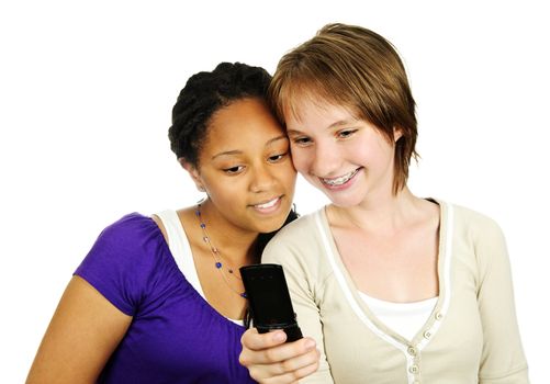Isolated portrait of two teenage girls with cell phone