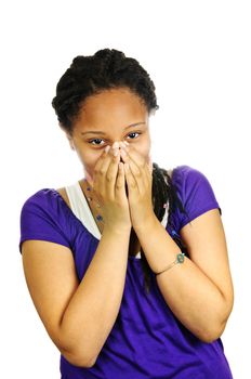 Isolated portrait of beautiful black teenage girl covering mouth