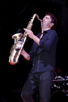 Duran Duran saxophonist Simon Willescroft live on stage in Malta on 26th July 2008 during Red Carpet Massacre Tour