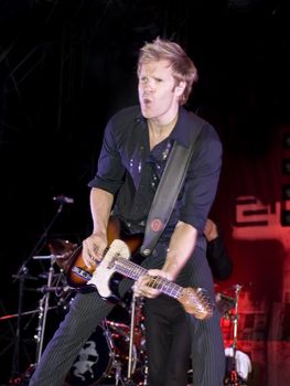 Duran Duran guitarist Dom Brown live on stage in Malta on 26th July 2008 during Red Carpet Massacre Tour