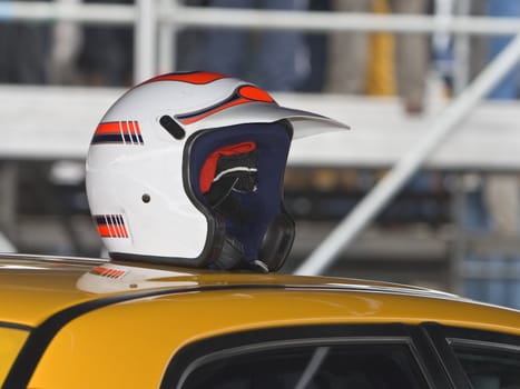 A helmet of a driver on a race car