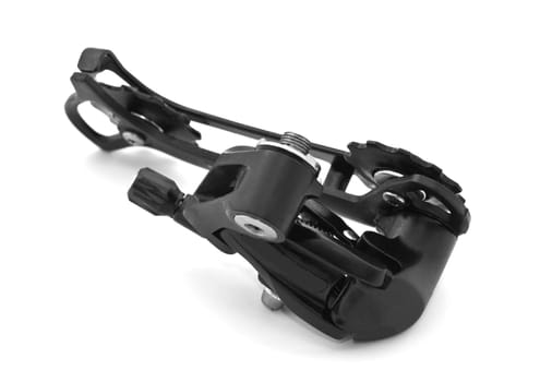 Bicycle rear derailleur against a white background.