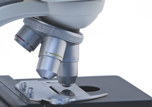 Close-up image of microscope lenses isolated against a white background.Shot with Canon 70-200mm f/2.8L IS USM