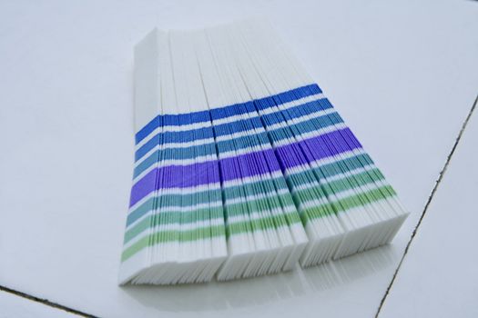 Indicator strips on a faience lab desk.