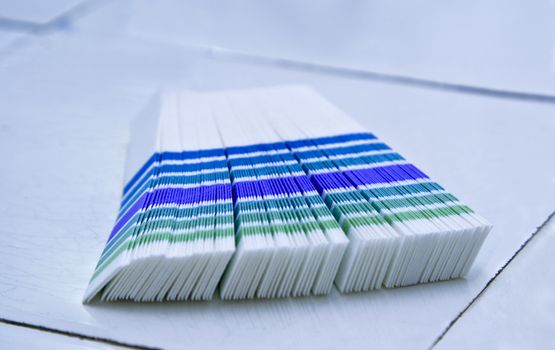 Indicator strips on a faience lab desk.