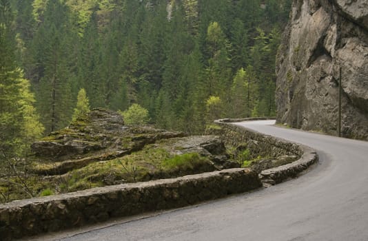 Road curve in Bicaz Canyon one of the most exciting travel road in Romania.