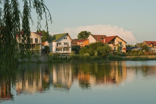 Dusk image in a holiday villas district at the lakeside.