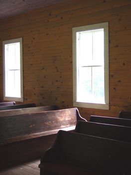 A pew inside an old appellation church.