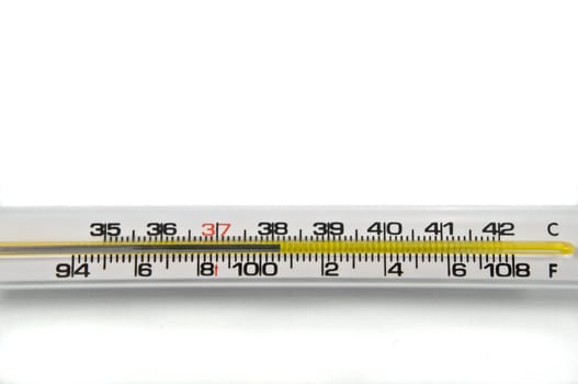 Close up of a mercury thermometer showing a high human temperature reading. Arranged horizontally on white.