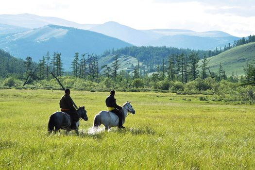 horsemen_crossing_a_high-mountainous_bog