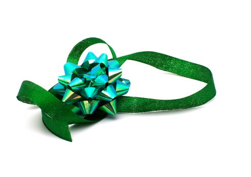 Green ribbon and bow on a white background.