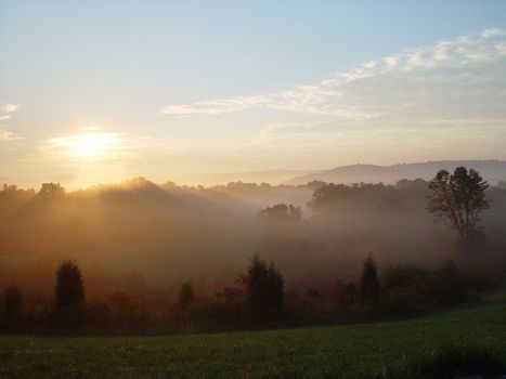 The sunrises over the hill country of Indiana.