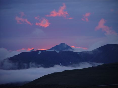 The clouds are on fire high up in the Rocky Mountains