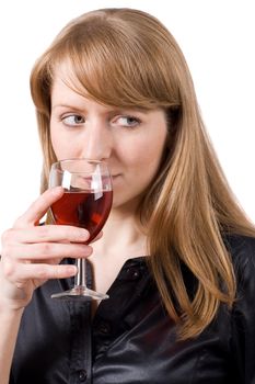 Young woman tasting a glass of wine. Isolated on white. #1