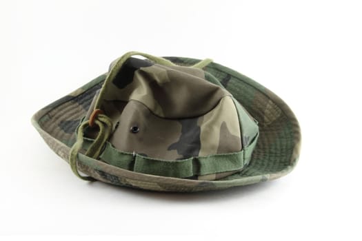 A camouflage hat, isolated on white.