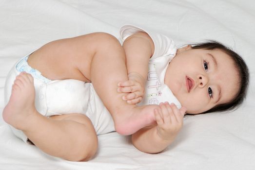  The baby of six months on a light background