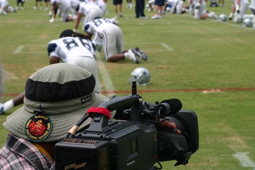 The Dallas Cowboys at their 2008 summer training camp in Oxnard, CA during a training session working out.