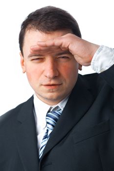 Close up portrait of young businessman looking far away