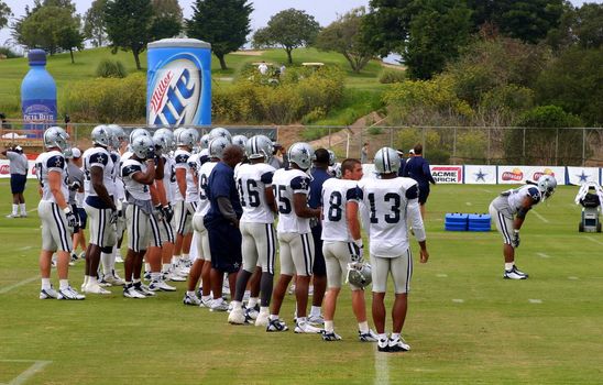 The Dallas Cowboys at their 2008 summer training camp in Oxnard, CA during a training session working out.