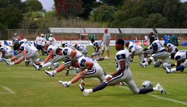 The Dallas Cowboys at their 2008 summer training camp in Oxnard, CA during a training session working out.