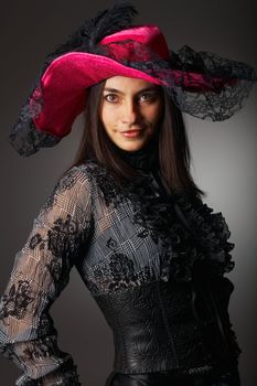 Beautiful woman in pink hat. Close-up view