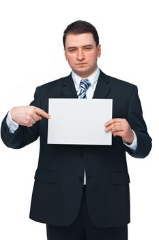 A successful business executive holding and pointing at an empty billboard 