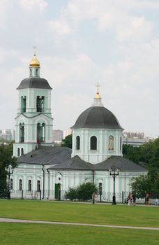 Christian church with gold domes in Moscow