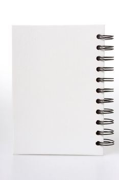 White notebook with black ring binders, isolated on white