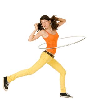 Joyful teenager girl with hula hoop on white background