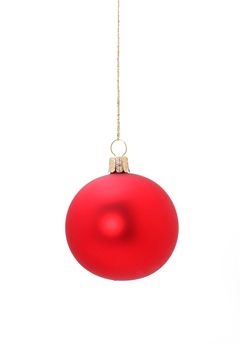A red christmas ball hanging from golden thread, shot in studio isolated on white. Perfect for your holiday designs or ads