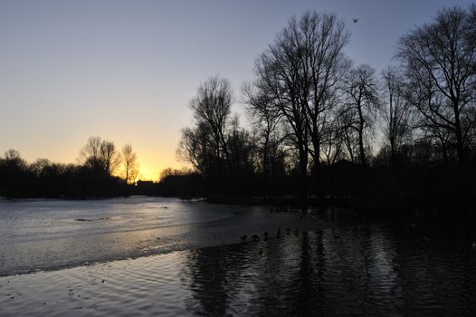 sunset scene from oostpark amsterdam