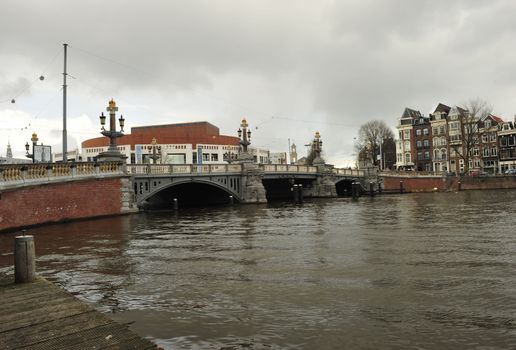 Dutch bridge at Waterlooplein Amsterdam taken from a wooden habour closeby