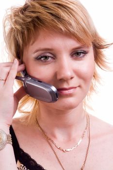 smiling woman with mobile phone on a white background