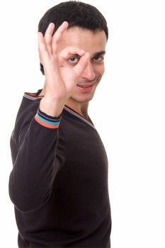 The young man with O.K. on a white background