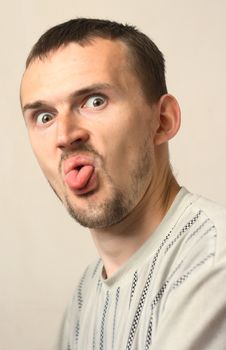 Portrait teased men on a light background